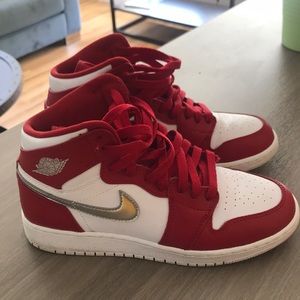 Red, white and silver Jordan 1s